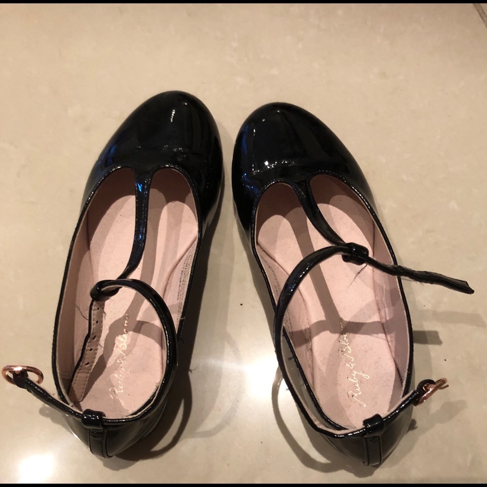 black “patent leather” looking shoes